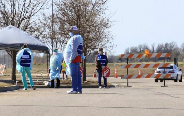 Pictured here, workers with the Oklahoma State Department of Health prepare to administer coronavirus tests at a drive-up testing clinic in Ponca City March 25. (Photo by Jordan Green/Journal-Tribune)
